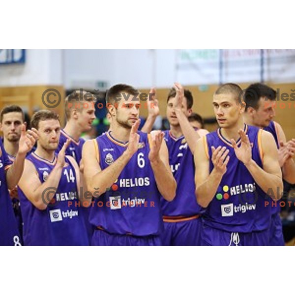 Jure Mocnik, Matej Rojc and Jaka Brodnik of Helios Suns in action during Nova KBM league basketball match between Sencur GGD and Helios Suns in Sencur Sports Hall, Slovenia on December 2, 2017