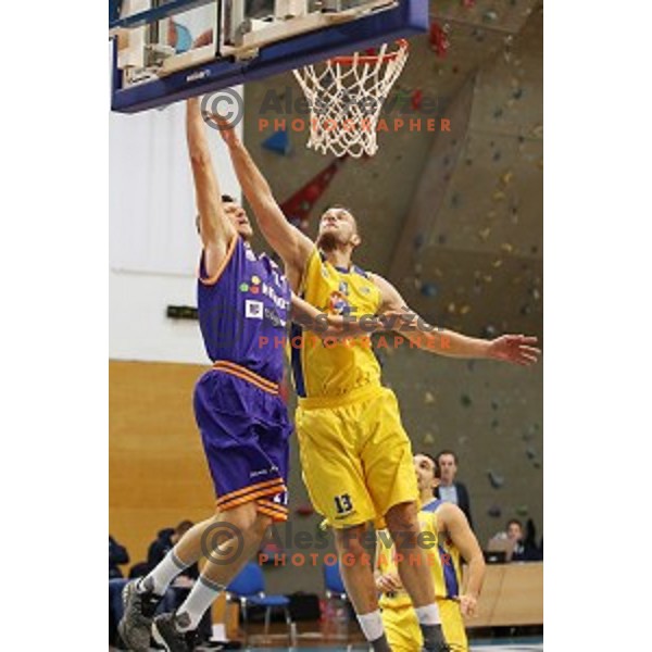 Blaz Mahkovic of Helios Suns and Smiljan Pavic of Sencur GGD in action during Nova KBM league basketball match between Sencur GGD and Helios Suns in Sencur Sports Hall, Slovenia on December 2, 2017