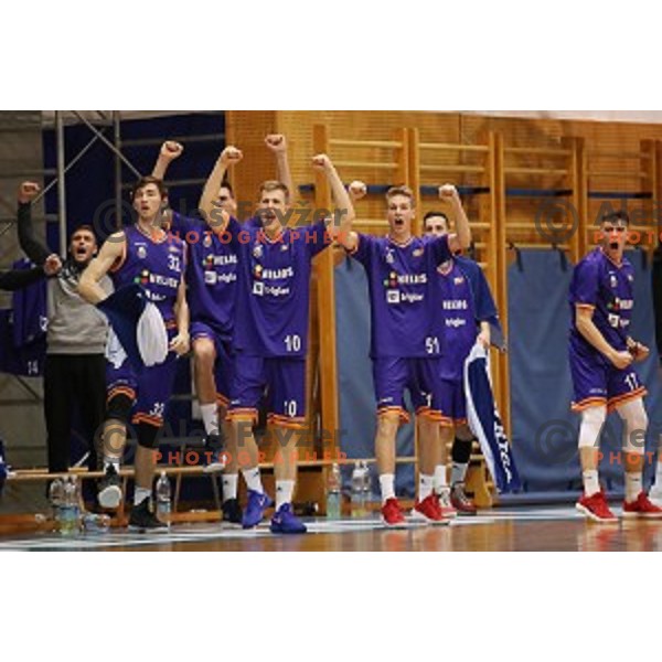 Alexander Shaskov, Urban Oman and Jakob Strel of Helios Suns celebrate during Nova KBM league basketball match between Sencur GGD and Helios Suns in Sencur Sports Hall, Slovenia on December 2, 2017
