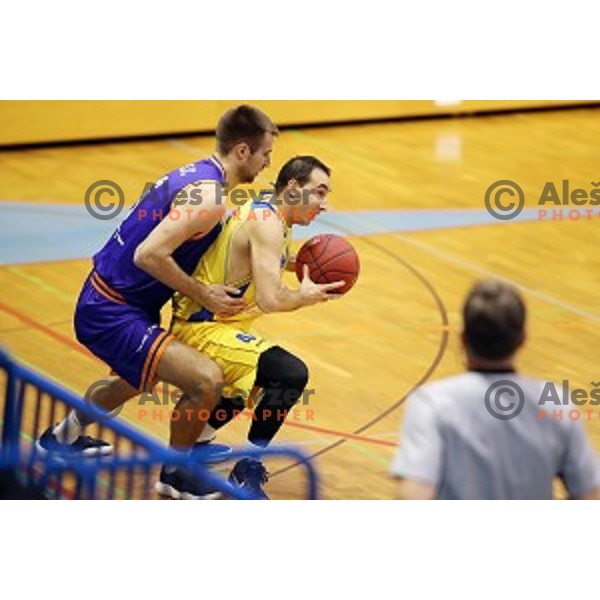 Matej Rojc and Miljan Pavkovic of Sencur GGD in action during Nova KBM league basketball match between Sencur GGD and Helios Suns in Sencur Sports Hall, Slovenia on December 2, 2017