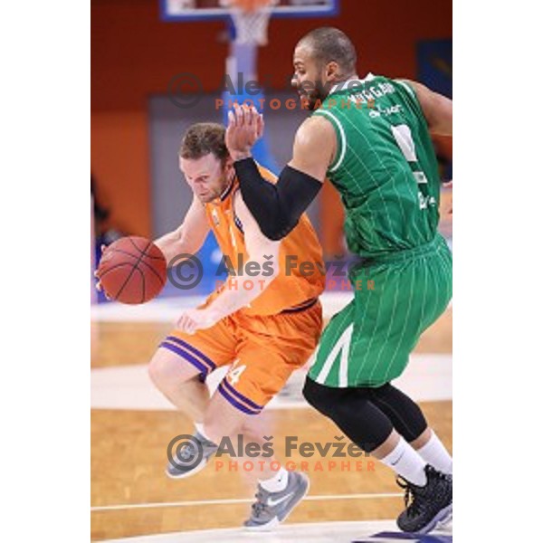 Jure Mocnik of Helios Suns and Jordan Morgan in action during Nova KBM league basketball match between Helios Suns and Petrol Olimpija in Domzale Sports Hall, Slovenia on December 10, 2017