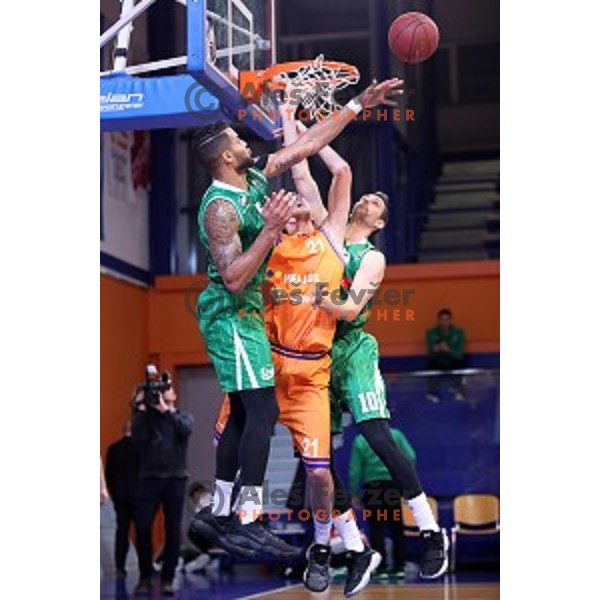 Devin Oliver, Blaz Mahkovic of Helios Suns and Domen Lorbek in action during Nova KBM league basketball match between Helios Suns and Petrol Olimpija in Domzale Sports Hall, Slovenia on December 10, 2017