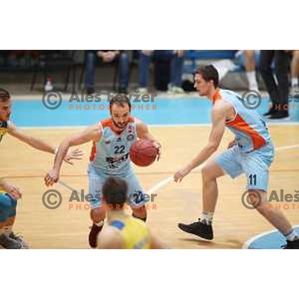 Danijel Vujasinovic and Jan Kosi in action during Nova KBM league basketball match between Hopsi Polzela and Sixt Primorska in Polzela Sports Hall, Slovenia on December 16, 2017
