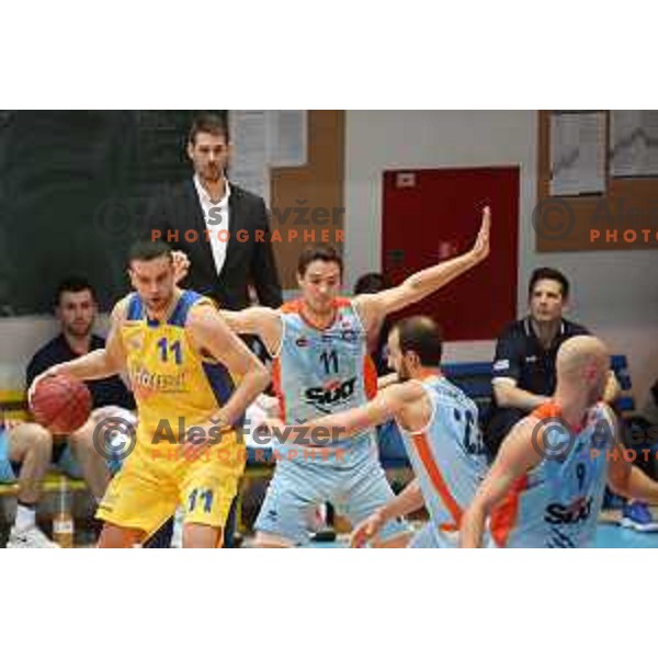 Ivan Drzic and Jan Kosi in action during Nova KBM league basketball match between Hopsi Polzela and Sixt Primorska in Polzela Sports Hall, Slovenia on December 16, 2017