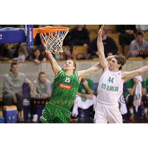 Gregor Hrovat of Petrol Olimpija and Luka Voncina of Ilirija in action during Nova KBM league basketball match between Ilirija and Petrol Olimpija in Tivoli Hall, Ljubljana, Slovenia on December 17, 2017