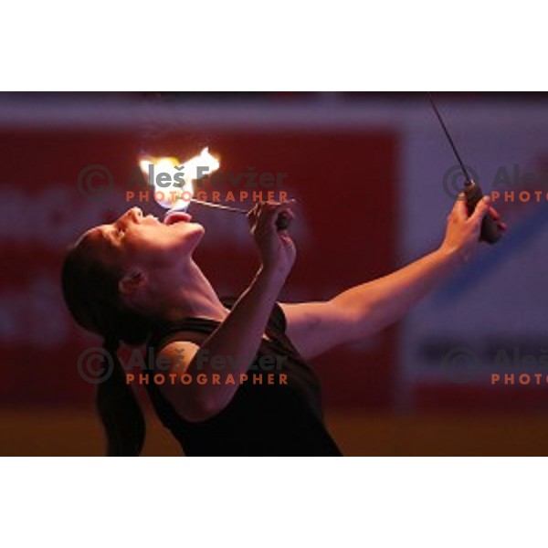 Katja Kobentar performs fire and flame during Alps League ice-hockey match between SIJ Acroni Jesenice and SZ Olimpija in Podmezakla Hall, Jesenice, Slovenia on December 30, 2017