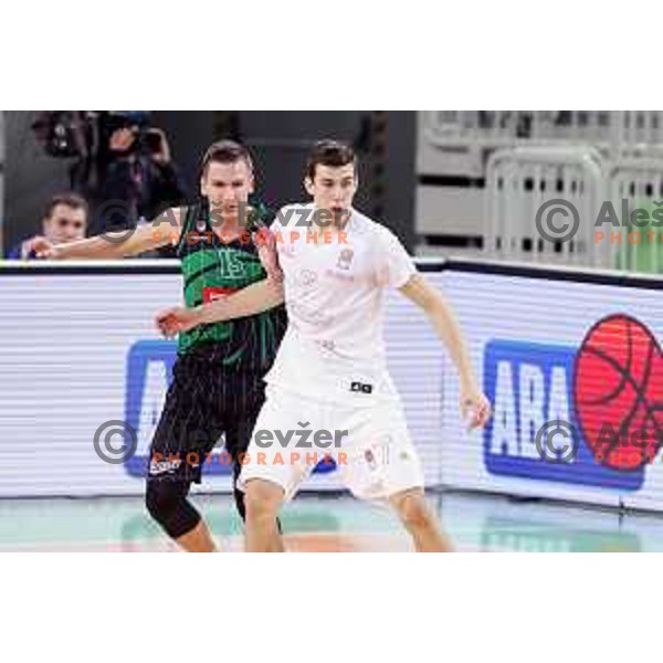 Gregor Hrovat and Vlatko Cancar in action during ABA league basketball match between Petrol Olimpija and Mega Bemax in SRC Stozice, Ljubljana on January 5, 2018