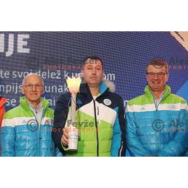 Miro Cerar, Tomaz Razingar, Ivo Carman and Slovenia Olympic team lights up Olympic flame in Ljubljana, Slovenia on January 9, 2018