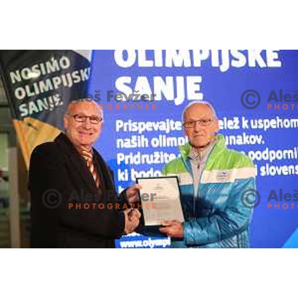 Bogdan Gabrovec, Miro Cerar and Slovenia Olympic team lights up Olympic flame in Ljubljana, Slovenia on January 9, 2018