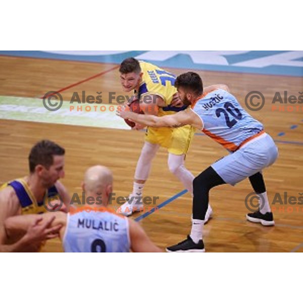 Jan Rebec and Alen Hodzic in action during Nova KBM league basketball match between Sencur GGD and Sixt Primorska in Sencur Sports Hall, Slovenia on January 13, 2018