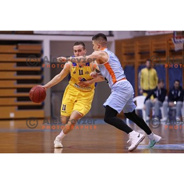 Matic Rebec of sixt and Nejc Martincic of Sencur GGD in action during Nova KBM league basketball match between Sencur GGD and Sixt Primorska in Sencur Sports Hall, Slovenia on January 13, 2018018