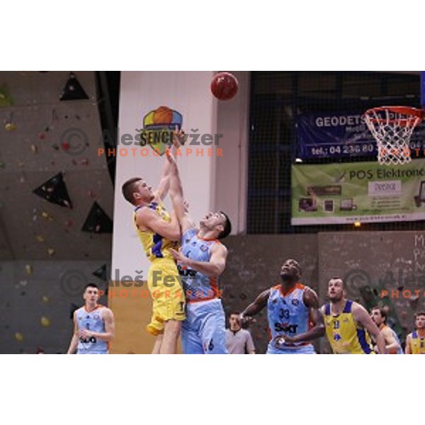 Dino Muric and Marjan Cakarun in action during Nova KBM league basketball match between Sencur GGD and Sixt Primorska in Sencur Sports Hall, Slovenia on January 13, 2018