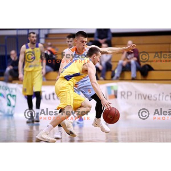 Matic Rebec of sixt and Nejc Martincic of Sencur GGD in action during Nova KBM league basketball match between Sencur GGD and Sixt Primorska in Sencur Sports Hall, Slovenia on January 13, 2018