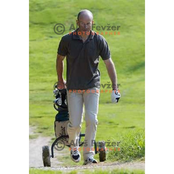 Ingemar Stenmark (SWE) Olympic and World gold medalist in alpine skiing playing golf at Bled, Slovenia on May 21, 2004