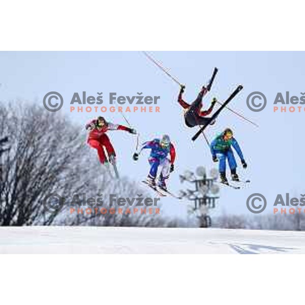 Christopher Delbosco (CAN) flying over Sergey Ridzik (OAR), Siegmar Klotz (ITA) and Francois Place (FRA) in 1/8 finals of Men\'s Ski Cross at Phoenix Snow park during PyeongChang 2018 Winter Olympic Games, South Korea on February 21, 2018