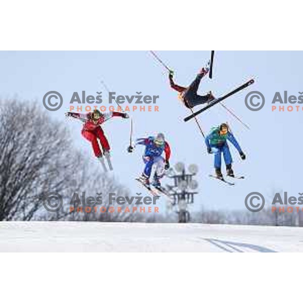 Christopher Delbosco (CAN) flying over Sergey Ridzik (OAR), Siegmar Klotz (ITA) and Francois Place (FRA) in 1/8 finals of Men\'s Ski Cross at Phoenix Snow park during PyeongChang 2018 Winter Olympic Games, South Korea on February 21, 2018