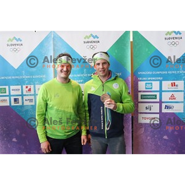 Coach Jernej Demsar and Zan Kosir, Olympic bronze medalist in Snowboard Parallel Giant Slalom from PyeongChang 2018 Winter Olympic games during press confefrence at Joze Pucnik Airport, Ljubljana, Slovenia on February 26, 2018