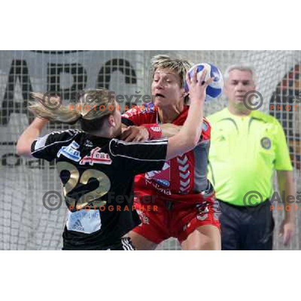 Anja Freser (11) tries to stop Ahlm (22) at handball game Krim Mercator-Sevehof in EHF Champions league, played in Ljubljana 5.01.2008. Photo by Ales Fevzer 