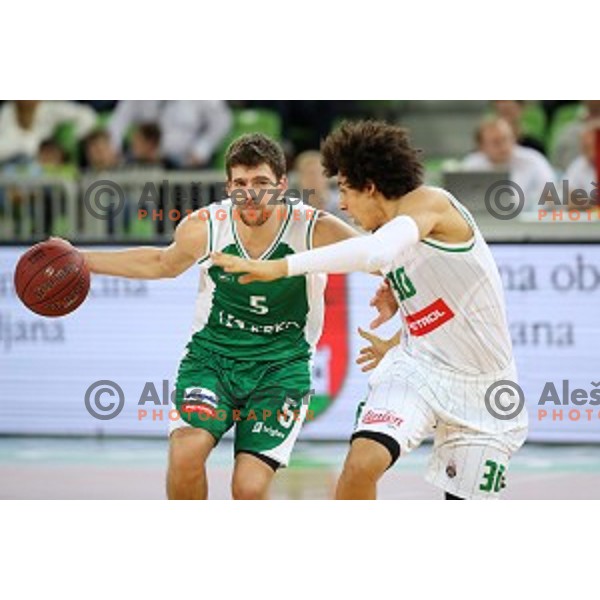 Paolo Marinelli and Issuf Sanon in action during Nova KBM league basketball match between Petrol Olimpija and Krka in Stozice, Ljubljana, Slovenia on March 17, 2018