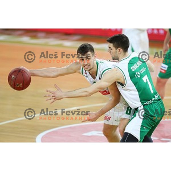 Roko Badzim and Tim Osolnik in action during Nova KBM league basketball match between Petrol Olimpija and Krka in Stozice, Ljubljana, Slovenia on March 17, 2018