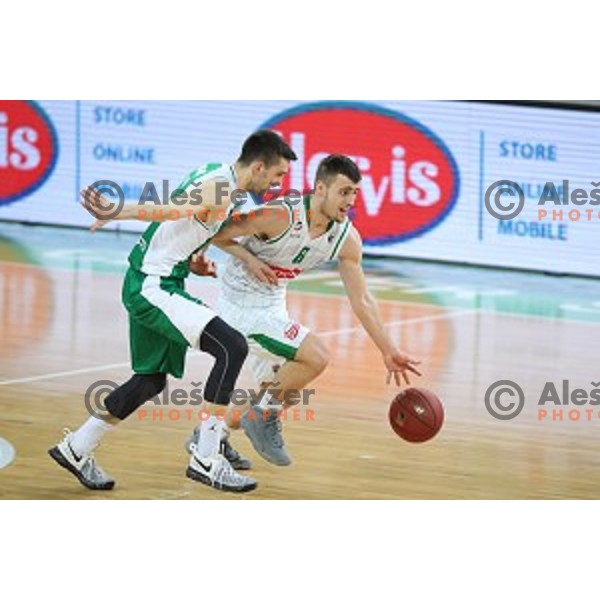 Roko Badzim and Tim Osolnik in action during Nova KBM league basketball match between Petrol Olimpija and Krka in Stozice, Ljubljana, Slovenia on March 17, 2018