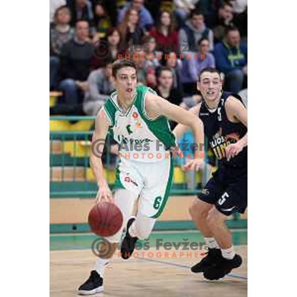Miha Skedelj of Krka and Urban Tajher of Helios Suns in action during Final of U-19 Boys Championship basketball match between Krka and Helios Suns in Novo mesto, Slovenia on March 25, 2018