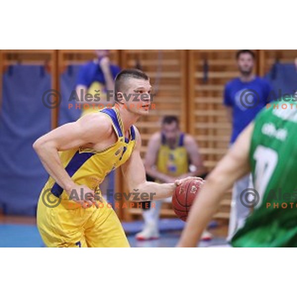 Dino Muric in action during Nova KBM league basketball match between Sencur GGD and Petrol Olimpija in Sencur sports Hall, Slovenia on April 11, 2018