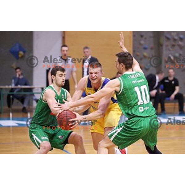 Dino Muric in action during Nova KBM league basketball match between Sencur GGD and Petrol Olimpija in Sencur sports Hall, Slovenia on April 11, 2018