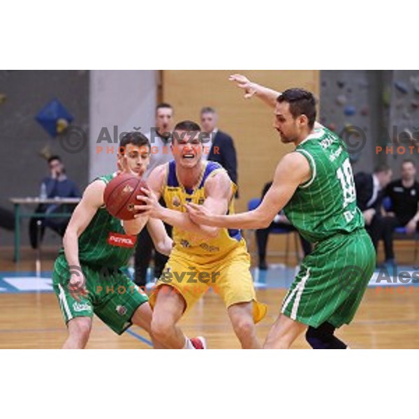 Dino Muric in action during Nova KBM league basketball match between Sencur GGD and Petrol Olimpija in Sencur sports Hall, Slovenia on April 11, 2018