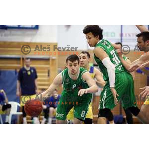Roko Badzim and Issuf Sanon in action during Nova KBM league basketball match between Sencur GGD and Petrol Olimpija in Sencur sports Hall, Slovenia on April 11, 2018