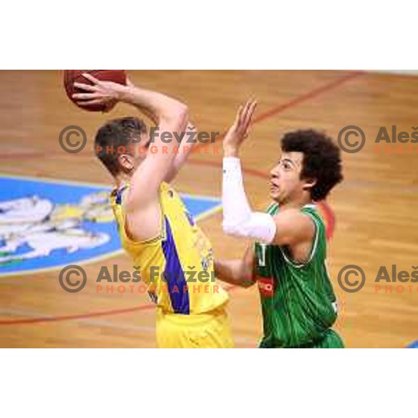 Jan Novak and Issuf Sanon in action during Nova KBM league basketball match between Sencur GGD and Petrol Olimpija in Sencur sports Hall, Slovenia on April 11, 2018