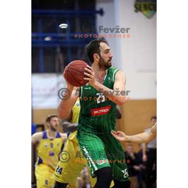 Mirza Begic in action during Nova KBM league basketball match between Sencur GGD and Petrol Olimpija in Sencur sports Hall, Slovenia on April 11, 2018
