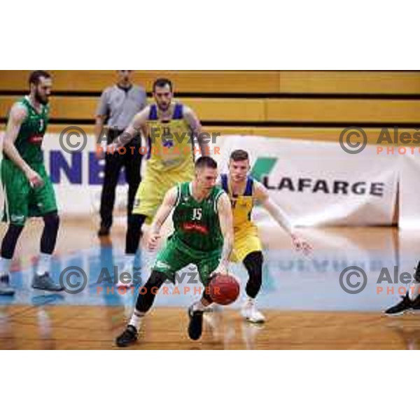 Gregor Hrovat and Jan Rebec in action during Nova KBM league basketball match between Sencur GGD and Petrol Olimpija in Sencur sports Hall, Slovenia on April 11, 2018