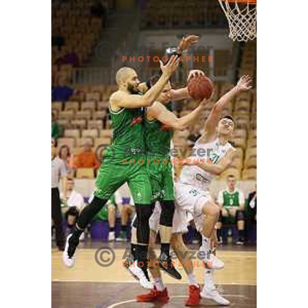 Jordan Morgan, Gregor Hrovat and Zan Mark Sisko in action during Nova KBM league basketball match between Ilirija and Petrol Olimpija in Hala Tivoli, Ljubljana, Slovenia on April 15, 2018