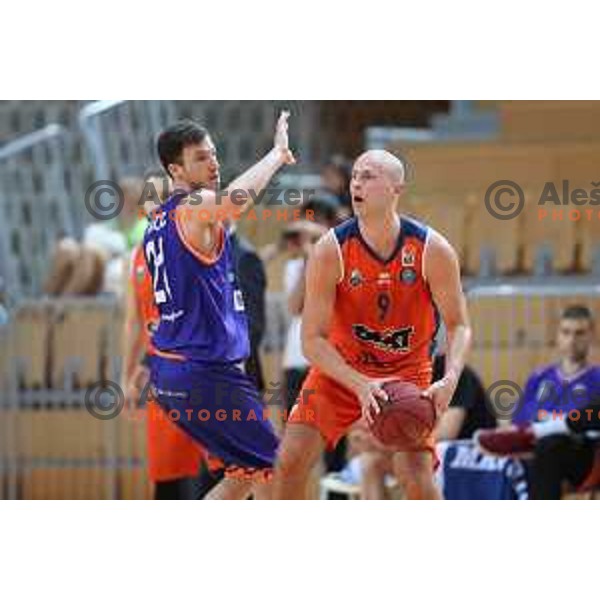 Mirko Mulalic and Blaz Mahkovic in action during Nova KBM league basketball match between Sixt Primorska-Helios Suns in Arena Bonifika in Koper, Slovenia on April 21, 2018