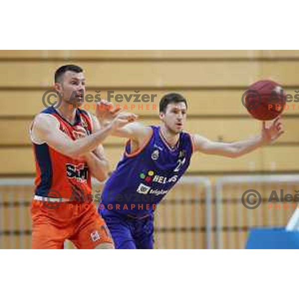 Zupan and Blaz Mahkovic in action during Nova KBM league basketball match between Sixt Primorska-Helios Suns in Arena Bonifika in Koper, Slovenia on April 21, 2018