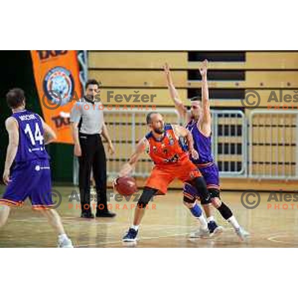 Nebojsa Joksimovic and Jure Pelko in action during Nova KBM league basketball match between Sixt Primorska-Helios Suns in Arena Bonifika in Koper, Slovenia on April 21, 2018