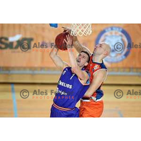 Jure Pelko and Mirko Mulalic in action during Nova KBM league basketball match between Sixt Primorska-Helios Suns in Arena Bonifika in Koper, Slovenia on April 21, 2018