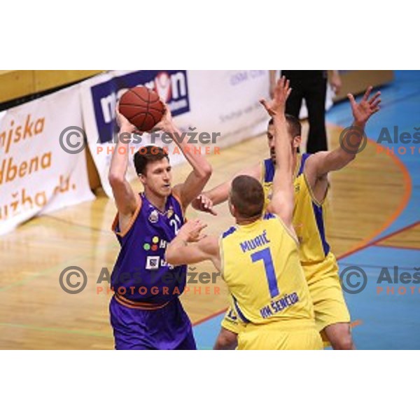 Blaz Mahkovic of Helios Suns and Dino Muric, Smiljan Pavic of Sencur GGD in action during Nova KBM league basketball match between Sencur GGD and Helios Suns in Sencur Sports Hall, Slovenia on April 30, 2018
