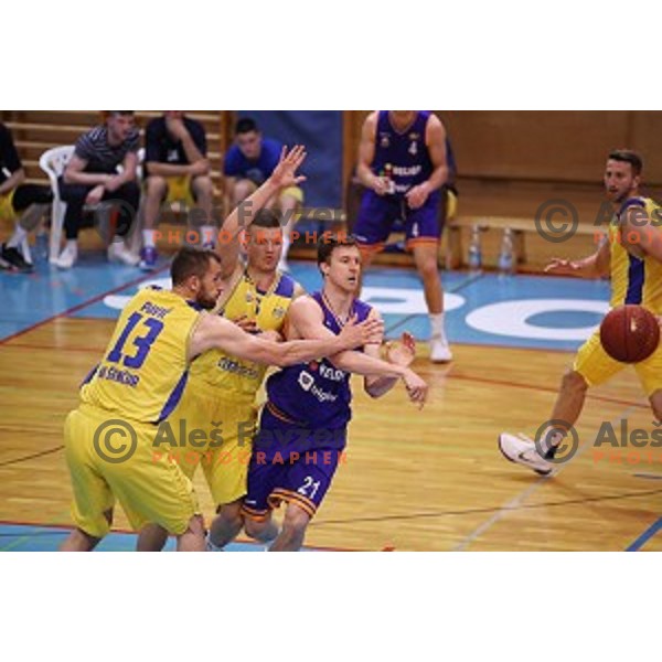 Blaz Mahkovic of Helios Suns and Dino Muric, Smiljan Pavic of Sencur GGD in action during Nova KBM league basketball match between Sencur GGD and Helios Suns in Sencur Sports Hall, Slovenia on April 30, 2018