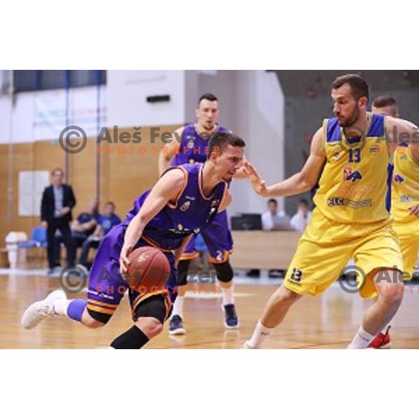 Jure Pelko of Helios Suns and Smiljan Pavic of Sencur GGD in action during Nova KBM league basketball match between Sencur GGD and Helios Suns in Sencur Sports Hall, Slovenia on April 30, 2018
