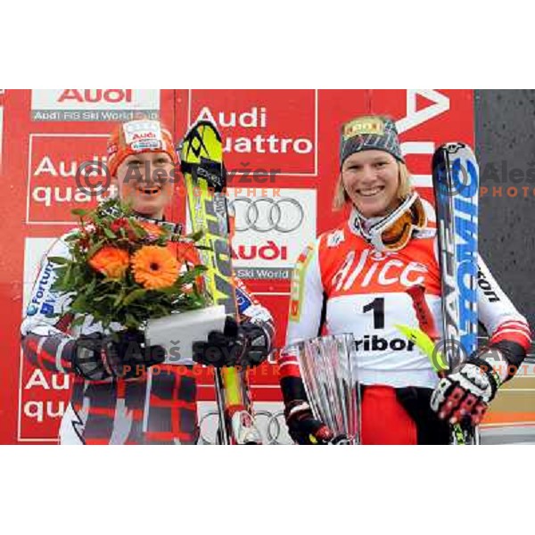 Poutiainen and Schild with tropies for third place in overall ranking at 44.Golden Fox Audi FIS Alpine Ski World Cup Slalom in Maribor13.1.2007. Photo by Ales Fevzer 