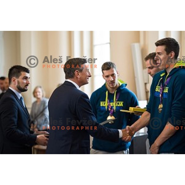 Borut Pahor and Vladko Cancar of the Slovenian basketball team at the presentation of the Golden Order of Slovenia, Presidential palace, Ljubljana, Slovenia