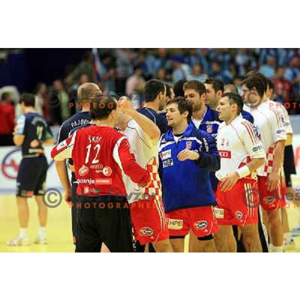 Norway, Stavanger, 20/01/2008. Croatian team shaking hands with Slovenian team after the third European Handball Championship preliminary match.
