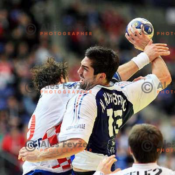 Norway, Lillehammer, 26/01/2008. Nikola KARABATIC (13) vs. Igor VORI (9) during the European Handball Championship semifinal match Croatia - France.