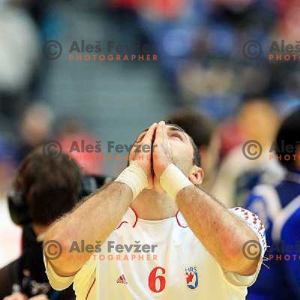 Norway, Lillehammer, 26/01/2008. Blazenko LACKOVIC (6) praying after winning the European Handball Championship semifinal match against France.