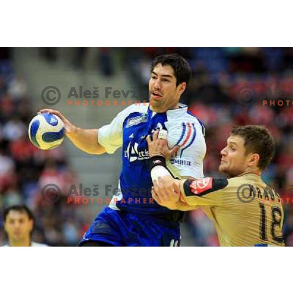 Norway, Lillehammer, 27/01/2008. Nikola KARABATIC (13) vs. Michael KRAUS (18) during the European Handball Championship 3/4 place ranking match Germany - France.