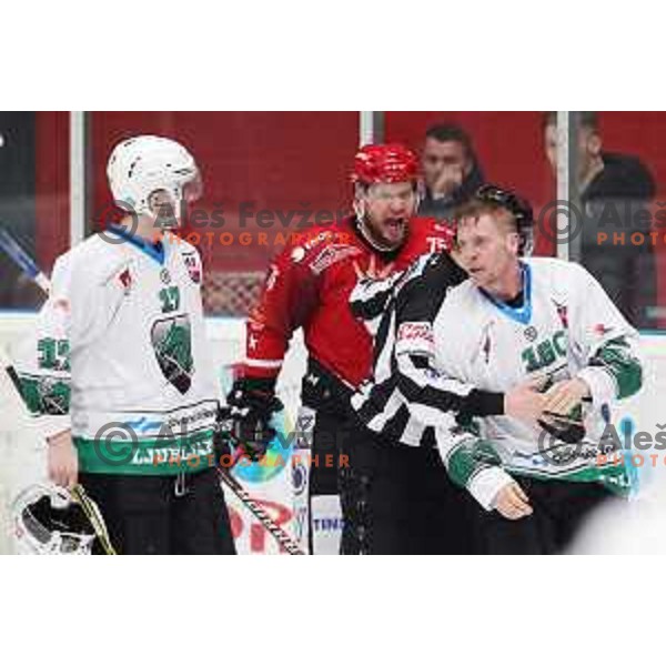 Mathieu Gagnon and Ales Music in action during Alps League ice-hockey match between Acroni Jesenice and SZ Olimpija in Podmezakla Hall, Jesenice, Slovenia on February 12, 2019