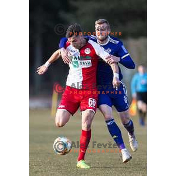 Ilija Martinovic vs Alexandru Cretu in action during soccer match between Aluminij and Maribor, Round 21 of PLTS 2018/19, played in Sportni park Kidricevo, Slovenia on March 3, 2019