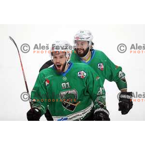 David Planko and Zan Jezovsek of SZ Olimpija in action during semi-final of Alps League ice-hockey match between SZ Olimpija and Lustenau in Tivoli Hall, Ljubljana, Slovenia on April 5, 201
